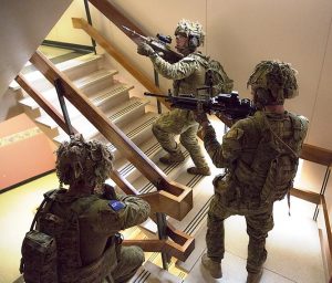 Soldiers conduct a multi-storey-building clearance as part of the 2017 Contested Urban Environment Strategic Challenge conducted in Adelaide South Australia. Photo by Corporal Craig Barrett.