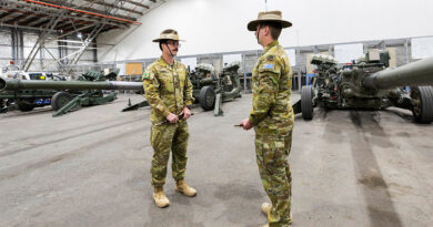 Australian Army soldier Bombardier Sean Dermody, of the School of Artillery, speaks to another Army soldier at Puckapunyal, Victoria. Story by Captain Charles Miranda. Photos by Corporal Johnny Huang.