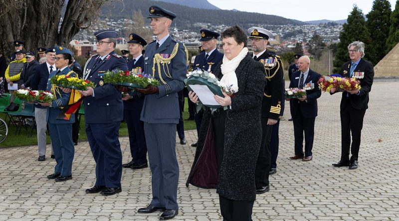 Members of the Australian Defence Force, RAAF Association, guests and representatives from Allied and Axis powers prepare for the wreath laying ceremony at the cenotaph in Hobart. Story by Flying Officer Wendy Pyper. Photos by Corporal Brett Sherriff.