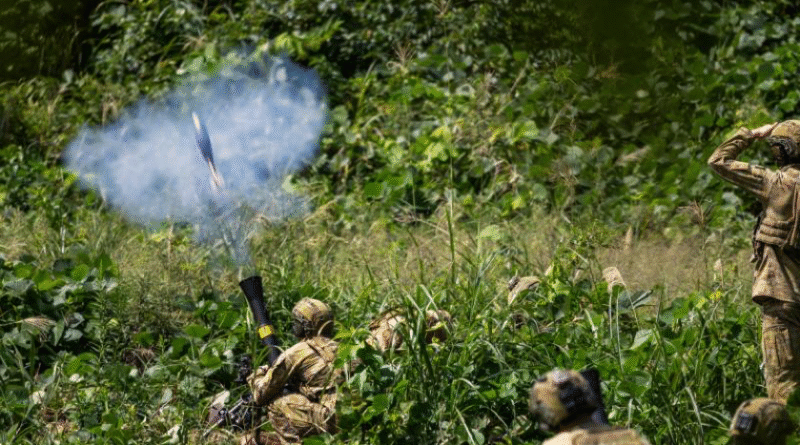 Australian Army soldiers from the 1st Battalion, the Royal Australian Regiment, fire an 81mm mortar during Exercise Orient Shield at the Sekiyama Training Area, Japan. Story by Major Diana Jennings. Photos by Lance Corporal Luke Donegan.