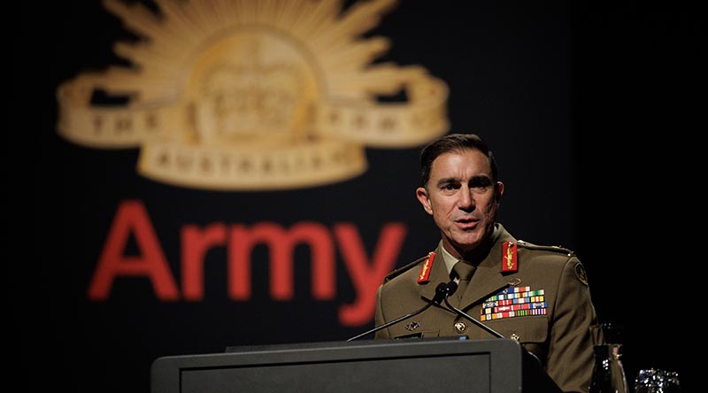 Chief of Army Lieutenant General Simon Stuart addresses the audience at the Chief of Army Symposium 2024 in Melbourne, Victoria. Photo by Corporal Cameron Pegg.