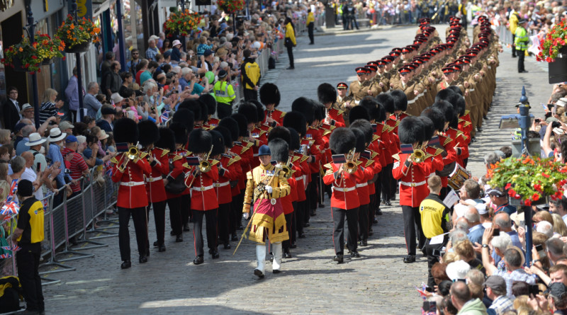 The Band of the Grenadier Guards lead an Armed Forces Day Parade through Guildford on Armed Forces Day 2015.