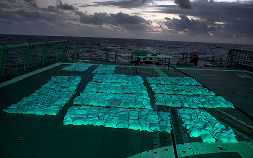 Narcotics from HMAS Newcastle's fifth seizure on the flight deck awaiting destruction.