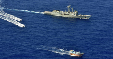 HMAS Newcastle's sea boats approach a dhow for a flag verification as part of operations involving narcotics interdiction off the east coast of Africa.