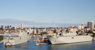 The largest ships ever built for the Royal Australian Navy, Landing Helicopter Dock NUSHIP Adelaide, left, and HMAS Canberra at Fleet Base East, Garden Island, Sydney.