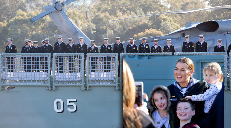 Crew members of HMAS Melbourne stand at attention on the flight deck as they depart Fleet Base East, Sydney - and, inset, Seaman Makinlee Clarke farewells her family. Photos by Able Seaman Kayla Hayes