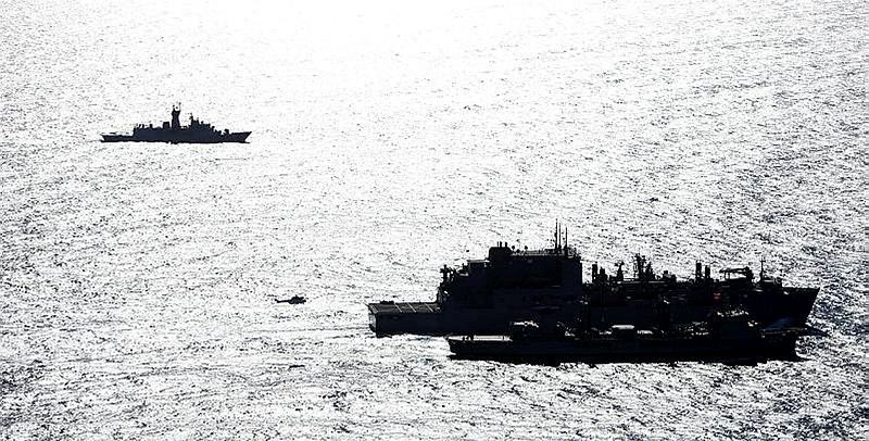 HMA Ships Success and Toowoomba conduct a Replenishment at Sea with United States Navy Ship (USNS) Cesar Chavez, as HMAS Perth stands off on station, while on Operation SOUTHERN INDIAN OCEAN, in search of missing Malaysia Airlines Flight MH370.