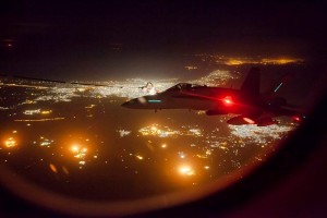 A coalition F/A-18 Hornet refuels from an RAAF KC-30A Multi Role Tanker Transport during an operational sortie. Photo by Sergeant Guy Young.