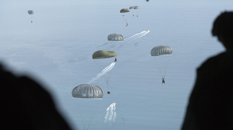 Australian Army Commandos parachute out of a Royal Australian Air Force C-130J Hercules during Exercise Northern Shield 2015.