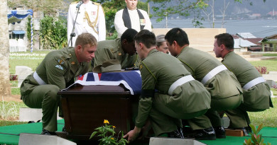 Soldiers from Australia's Federation Guard carry a coffin containing the remains of an unknown Australian soldier to his final resting place at the Commonwealth War Graves Cemetery in Ambon, Indonesia, on 10 September 2015. Photo by Commander Fenn Kemp