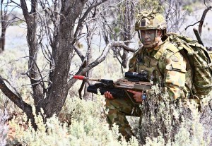 A 7RAR soldier in full body armour,light-weight helmet and "soldier carriage ensemble (minus pack)". Photo by Brian Hartigan.