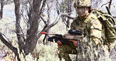 A 7RAR soldier in full body armour,light-weight helmet and "soldier carriage ensemble (minus pack)". Photo by Brian Hartigan.