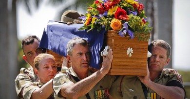 An Australian Army bearer party carries the coffin of the late Major General 'Digger' James during his funeral service at Pinaroo Cemetery in Brisbane's north on 22 October 2015.