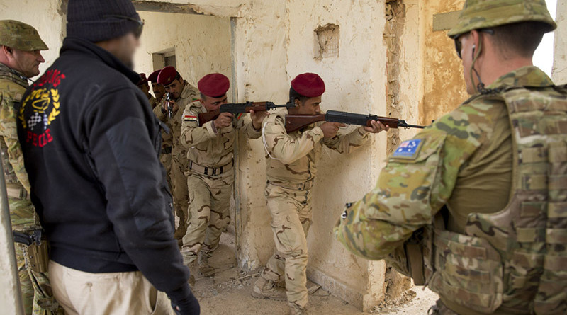 Australian Army trainers observe Iraqi Army soldiers conduct a room clearance drills at the Taji Military Complex, Iraq. Photo by Corporal Matthew Bickerton