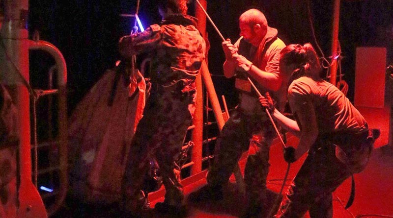 HMAS Melbourne Ship's Company load onboard an illegal cargo of narcotics. HMAS Melbourne intercepted the fishing vessel in the Indian Ocean and a subsequent search of the vessel revealed over 118 kilograms of high-grade heroin valued at AUD$108.8 million. Photo by Able Seaman Bonny Gassner