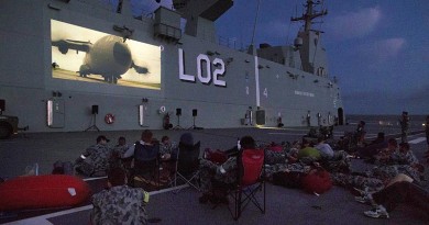 HMAS Canberra's ship's company watch a movie on the flight deck while at anchor in Jervis Bay during Fleet Concentration Period 2015. Photo by Leading Seaman Helen Frank