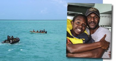 Seaman Edmund Tomsana hugs his sister during an unusual family reunion. Photos by Leading Seaman Sarah Ebsworth