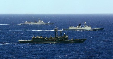 HMAS Darwin (front), PLA-N Yiyang and PLA-N Jinan transit through waters off the Brisbane coast. Photo by Able Seaman Sarah Ebsworth