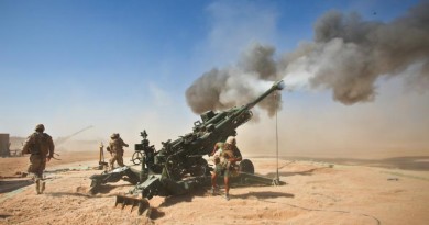US Marines fire an M982 Excalibur round from an M777 155mm howitzer at Fire Base Fiddlers Green, Helmand province, Afghanistan, 1 October 2011. (Photo: US Department of Defense)(PRNewsFoto/Raytheon Company)