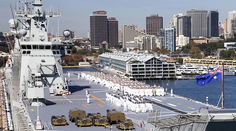 Fleet Divisions on the flight deck of HMAS Adelaide. Photo by Petty Officer Kelvin Hockey