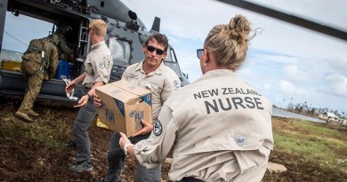 A RNZAF NH90 Helicopter lands in Nasau, Koro Island to deliver personnel, aid, and equipment. The NZDF has deployed to Fiji to provide Humanitarian Aid and Distaster Relief following Tropical Cyclone Winston. Members of the New Zeland Medical Assistance Team help unload.