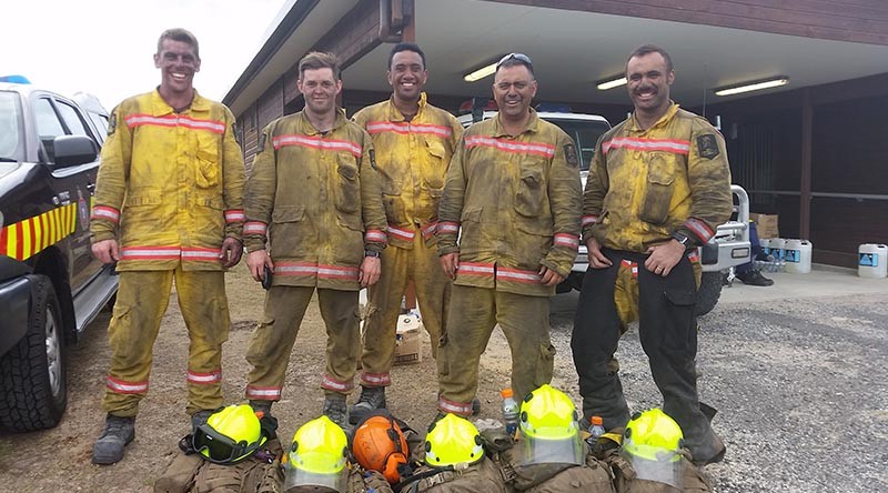 NZDF firefighters in Tasmania, Lance Corporal Thomas Grant, Leading Aircraftman Jonathan McGovern, Lance Corporal Lance Harris, Warrant Officer Class 1 Brent Ruruku and Corporal Joshua Nahi after a day of fighting wildfires at Arthur River in north-western Tasmania.