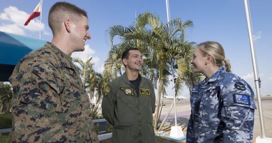 First Lieutenant Michael Maggitti of the United States Marine Corps (left) and Lieutenant Commander Ian Burgess of the United States Navy chat with Flying Officer Danica Ellis of 92 Wing during Exercise Balikatan 2016. Photo by Corporal David Said