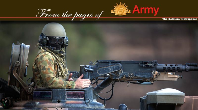 Australian Army soldier Lance Corporal Warren Cooper behind the 50cal machine gun of an M1A1 Abrams tank during Exercise Jericho Dawn held at Puckapunyal, Victoria. Photo by Corporal Oliver Carter.