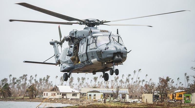 A RNZAF NH90 lands in Nasau, Koro Island to deliver personnel, aid, and equipment.