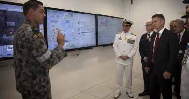 Leading Seaman Maritime Technician Nathan Cook briefs Chief of Navy, Vice Admiral Tim Barrett and the Matt Thistlethwaite MP. Photo by Able Seaman Bonnie Gassner.