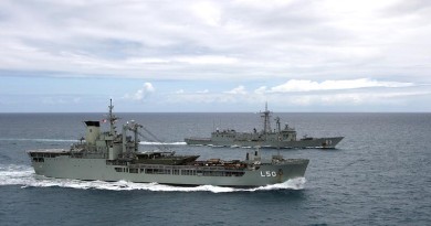 HMAS Tobruk and HMAS Sydney conduct Officer of the Watch manoeuvres (2013).