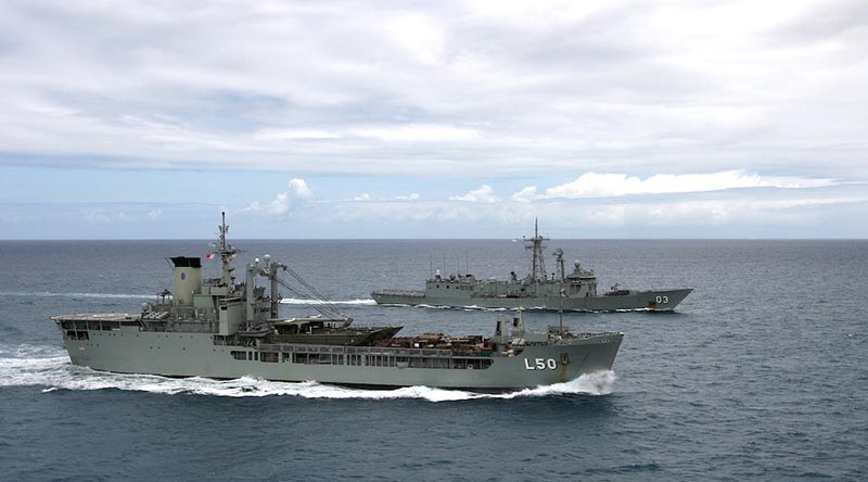 HMAS Tobruk and HMAS Sydney conduct Officer of the Watch manoeuvres (2013).