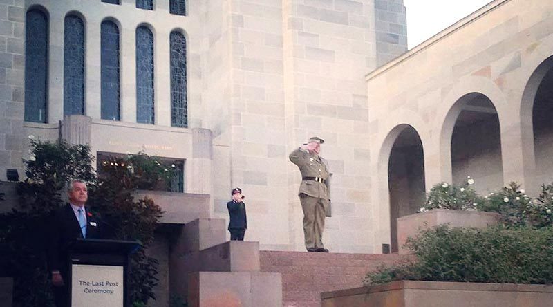 Drew Douglas salutes during The Last Post Ceremony at the Australian War Memorial