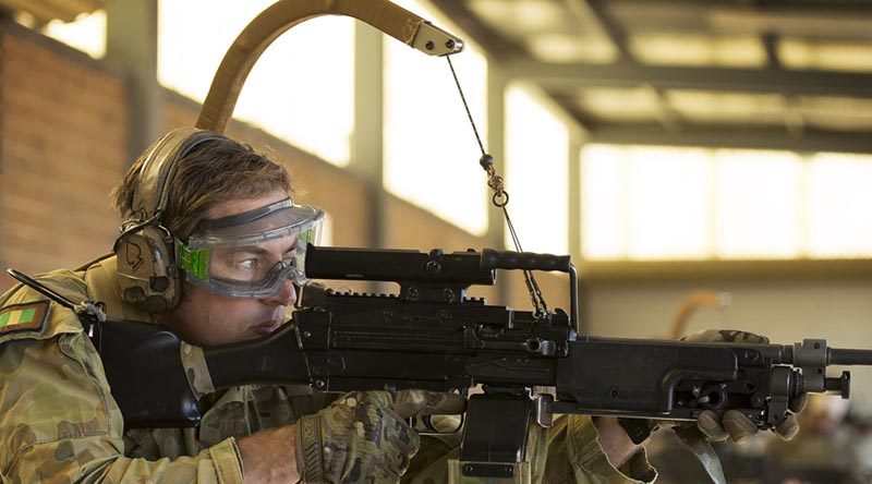 Corporal Paul Hayes, 6RAR, trials the Reaper weapon carriage system. Photo by Corporal Janine Fabre