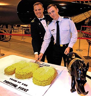 CO No. 1 Squadron WGCDR Steve and the squadron’s youngest member, AC Rory Davis, cut the cake at the dining-in night to celebrate the squadron’s centenary. Photo by Corporal Ben Dempster