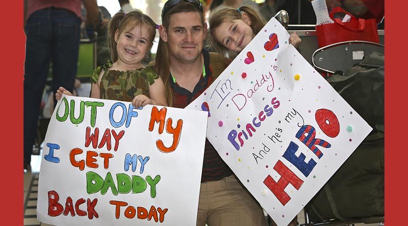 An Australian Army soldier is greeted by loved ones at Brisbane International Airport on 9 June 2016 after returning from a six-month deployment to the Taji Military Complex in Iraq as part of Operation Okra.