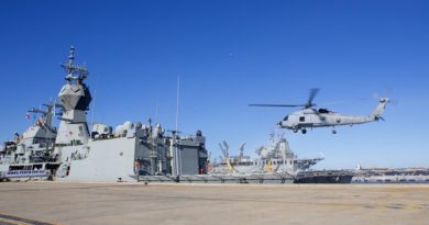 HMAS Perth receives her MH-60R 'Romeo' helicopter before departure on operation Manitou.