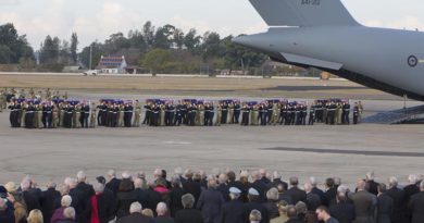 Australian Defence Force personnel from Australia’s Federation Guard carry the coffins of the 33 Australian service personnel and dependants from a Royal Australian Air Force C-17A Globemaster aircraft during the repatriation ceremony at RAAF Base Richmond in Sydney on Thursday, 02 June 2016.