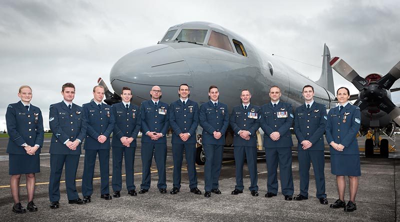 No. 5 Squadron 15/01 Orion Conversion Course graduates pose in front of the P-3K2 Orion on which they participated in a real-life search and rescue operation during their training.