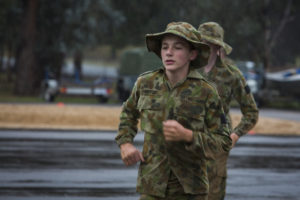 Australian Air Force Cadet Sam Venturi gets a taste of battle PT in the Canberra cold and rain at the Australian Defence Force Academy. *** Local Caption *** Australian Air Force Cadets (AAFC) from No 2 Wing commemorated the 75th anniversary of the AAFCs with a tour of military establishments and museums/memorials in Williamtown, Canberra and Sydney. The Australian Air Force Cadets (AAFC) is a youth oriented organisation that is administered and actively supported by the Royal Australian Air Force. The AAFC teaches you valuable life skills and will help you develop qualities including leadership, self reliance, confidence, teamwork and communication. Their fundamental aim is to foster qualities that will enable cadets to become responsible young adults, who will make a valuable contribution to the community. Please note the following distinction: Australian Air Force Cadets (AAFC), along with Australian Navy Cadets and Australian Army Cadets are members of the Australian Defence Force (ADF) Cadets. ADF Cadets are participants in the youth development program conducted by the three services in cooperation with the community but they are not members of the ADF. Officer Cadets (Air Force) and Staff Cadets (Army) are trainee officers undertaking instruction at the Australian Defence Force Academy or the Air Force Officers' Training School or Royal Military College Duntroon, The terms 'ADF Cadets', 'Officer Cadets' and 'Staff Cadets' are not interchangeable. Trainee naval officers are not cadets; they are commissioned officers with the rank of Midshipman.