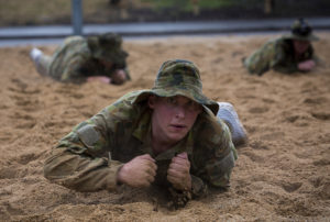 Australian Air Force Cadet Josh Hillwebber leopard crawls during battle PT in the Canberra cold and rain at the Australian Defence Force Academy. *** Local Caption *** Australian Air Force Cadets (AAFC) from No 2 Wing commemorated the 75th anniversary of the AAFCs with a tour of military establishments and museums/memorials in Williamtown, Canberra and Sydney. The Australian Air Force Cadets (AAFC) is a youth oriented organisation that is administered and actively supported by the Royal Australian Air Force. The AAFC teaches you valuable life skills and will help you develop qualities including leadership, self reliance, confidence, teamwork and communication. Their fundamental aim is to foster qualities that will enable cadets to become responsible young adults, who will make a valuable contribution to the community. Please note the following distinction: Australian Air Force Cadets (AAFC), along with Australian Navy Cadets and Australian Army Cadets are members of the Australian Defence Force (ADF) Cadets. ADF Cadets are participants in the youth development program conducted by the three services in cooperation with the community but they are not members of the ADF. Officer Cadets (Air Force) and Staff Cadets (Army) are trainee officers undertaking instruction at the Australian Defence Force Academy or the Air Force Officers' Training School or Royal Military College Duntroon, The terms 'ADF Cadets', 'Officer Cadets' and 'Staff Cadets' are not interchangeable. Trainee naval officers are not cadets; they are commissioned officers with the rank of Midshipman.