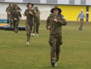 Australian Air Force Cadet Shannon Stephens running to the next obstacle during battle PT at the Australian Defence Force Academy. *** Local Caption *** Australian Air Force Cadets (AAFC) from No 2 Wing commemorated the 75th anniversary of the AAFCs with a tour of military establishments and museums/memorials in Williamtown, Canberra and Sydney. The Australian Air Force Cadets (AAFC) is a youth oriented organisation that is administered and actively supported by the Royal Australian Air Force. The AAFC teaches you valuable life skills and will help you develop qualities including leadership, self reliance, confidence, teamwork and communication. Their fundamental aim is to foster qualities that will enable cadets to become responsible young adults, who will make a valuable contribution to the community. Please note the following distinction: Australian Air Force Cadets (AAFC), along with Australian Navy Cadets and Australian Army Cadets are members of the Australian Defence Force (ADF) Cadets. ADF Cadets are participants in the youth development program conducted by the three services in cooperation with the community but they are not members of the ADF. Officer Cadets (Air Force) and Staff Cadets (Army) are trainee officers undertaking instruction at the Australian Defence Force Academy or the Air Force Officers' Training School or Royal Military College Duntroon, The terms 'ADF Cadets', 'Officer Cadets' and 'Staff Cadets' are not interchangeable. Trainee naval officers are not cadets; they are commissioned officers with the rank of Midshipman.