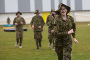 Australian Air Force Cadets Alleha Read running to the next obstacle during battle PT in the Canberra cold and rain at the Australian Defence Force Academy. *** Local Caption *** Australian Air Force Cadets (AAFC) from No 2 Wing commemorated the 75th anniversary of the AAFCs with a tour of military establishments and museums/memorials in Williamtown, Canberra and Sydney. The Australian Air Force Cadets (AAFC) is a youth oriented organisation that is administered and actively supported by the Royal Australian Air Force. The AAFC teaches you valuable life skills and will help you develop qualities including leadership, self reliance, confidence, teamwork and communication. Their fundamental aim is to foster qualities that will enable cadets to become responsible young adults, who will make a valuable contribution to the community. Please note the following distinction: Australian Air Force Cadets (AAFC), along with Australian Navy Cadets and Australian Army Cadets are members of the Australian Defence Force (ADF) Cadets. ADF Cadets are participants in the youth development program conducted by the three services in cooperation with the community but they are not members of the ADF. Officer Cadets (Air Force) and Staff Cadets (Army) are trainee officers undertaking instruction at the Australian Defence Force Academy or the Air Force Officers' Training School or Royal Military College Duntroon, The terms 'ADF Cadets', 'Officer Cadets' and 'Staff Cadets' are not interchangeable. Trainee naval officers are not cadets; they are commissioned officers with the rank of Midshipman.