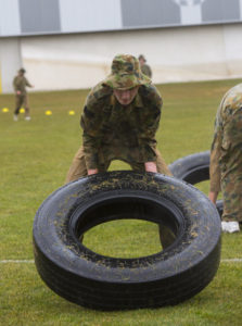 Australian Air Force Cadets Kyle Storeywood flipping a tyre during battle PT in the Canberra cold and rain at the Australian Defence Force Academy. *** Local Caption *** Australian Air Force Cadets (AAFC) from No 2 Wing commemorated the 75th anniversary of the AAFCs with a tour of military establishments and museums/memorials in Williamtown, Canberra and Sydney. The Australian Air Force Cadets (AAFC) is a youth oriented organisation that is administered and actively supported by the Royal Australian Air Force. The AAFC teaches you valuable life skills and will help you develop qualities including leadership, self reliance, confidence, teamwork and communication. Their fundamental aim is to foster qualities that will enable cadets to become responsible young adults, who will make a valuable contribution to the community. Please note the following distinction: Australian Air Force Cadets (AAFC), along with Australian Navy Cadets and Australian Army Cadets are members of the Australian Defence Force (ADF) Cadets. ADF Cadets are participants in the youth development program conducted by the three services in cooperation with the community but they are not members of the ADF. Officer Cadets (Air Force) and Staff Cadets (Army) are trainee officers undertaking instruction at the Australian Defence Force Academy or the Air Force Officers' Training School or Royal Military College Duntroon, The terms 'ADF Cadets', 'Officer Cadets' and 'Staff Cadets' are not interchangeable. Trainee naval officers are not cadets; they are commissioned officers with the rank of Midshipman.