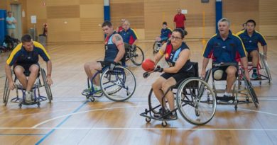 File photo – Wheelchair Aussie Rules player Corporal Sarah Mayadas takes a shot at goal during the first officially organised game of Wheelchair Australian Rules at RAAF Base Edinburgh in 2015. Photo by Corporal Nunu Campos