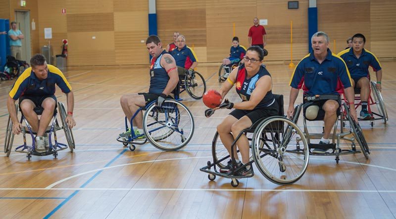 File photo – Wheelchair Aussie Rules player Corporal Sarah Mayadas takes a shot at goal during the first officially organised game of Wheelchair Australian Rules at RAAF Base Edinburgh in 2015. Photo by Corporal Nunu Campos
