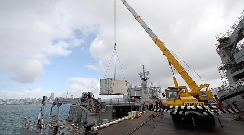 A container of medical supplies being loaded onto HMNZS Wellington, bound for Vanuatu.