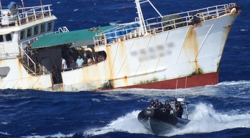 A boarding team that includes compliance officers from the Ministry for Primary Industries returns to HMNZS Otago after a boarding during patrols in Tuvalu’s Exclusive Economic Zone.