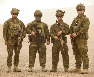 Private Jermaine Stuart (left) and his colleagues, Private Corey Bidart, Corporal Samuel Bruce and Private Sean Birkett, in Iraq.