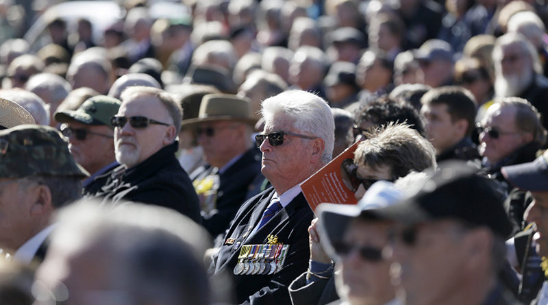 Some of the hundreds of attendees at the Vietnam Veteran's Day service on Anzac Parade.